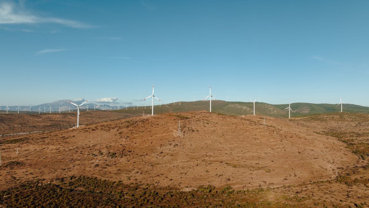 Wind turbines stretch across the rolling hills of Çeşme, İzmir, Türkiye.